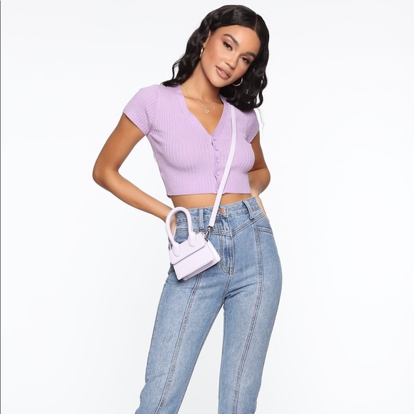 Lavender
Mini Bag
Boxy Shape
Crossbody Strap
Faux Leather - Picture 4 of 4